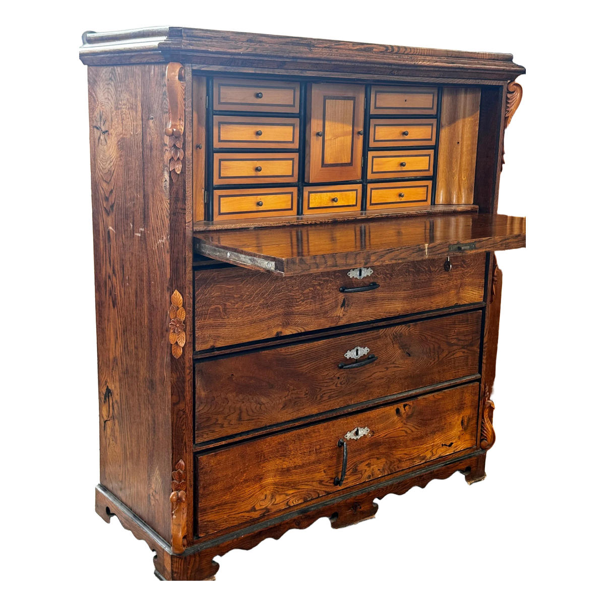 Wooden secretary desk with carved details and internal drawers