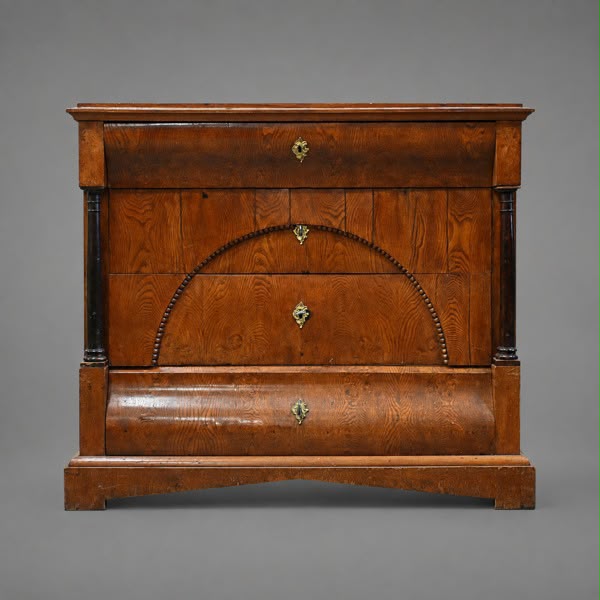 Antique wooden chest of drawers with arched facade and columns
