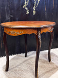 Louis XV style oval parlor table with floral intarsia