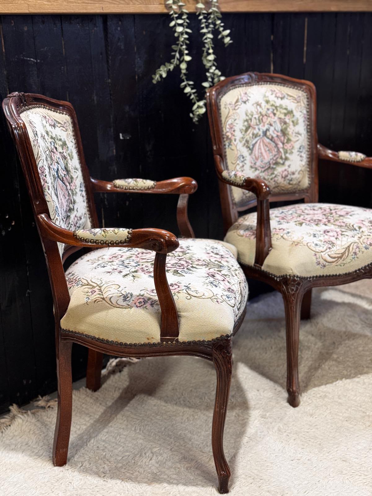 A par of Rococo style armchairs.