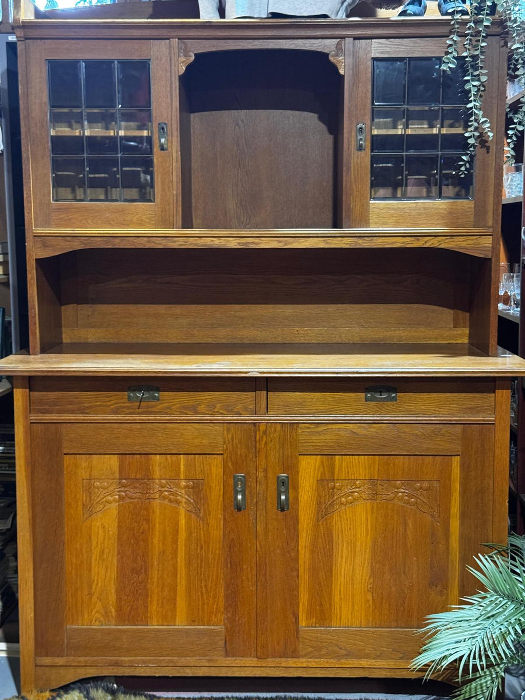 Solid wood buffet with carvings and faceted glass display cabinets