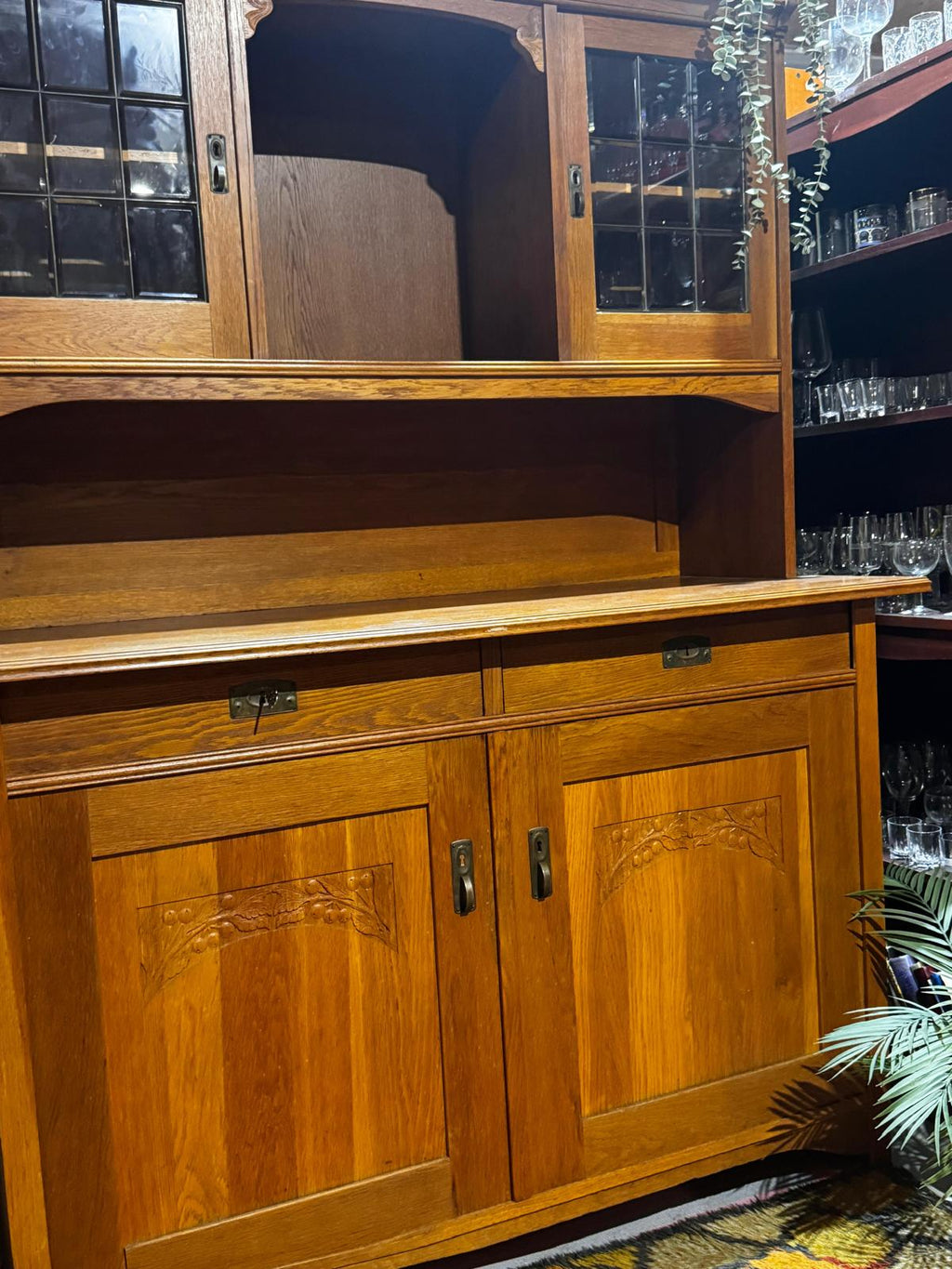 Solid wood buffet with carvings and faceted glass display cabinets