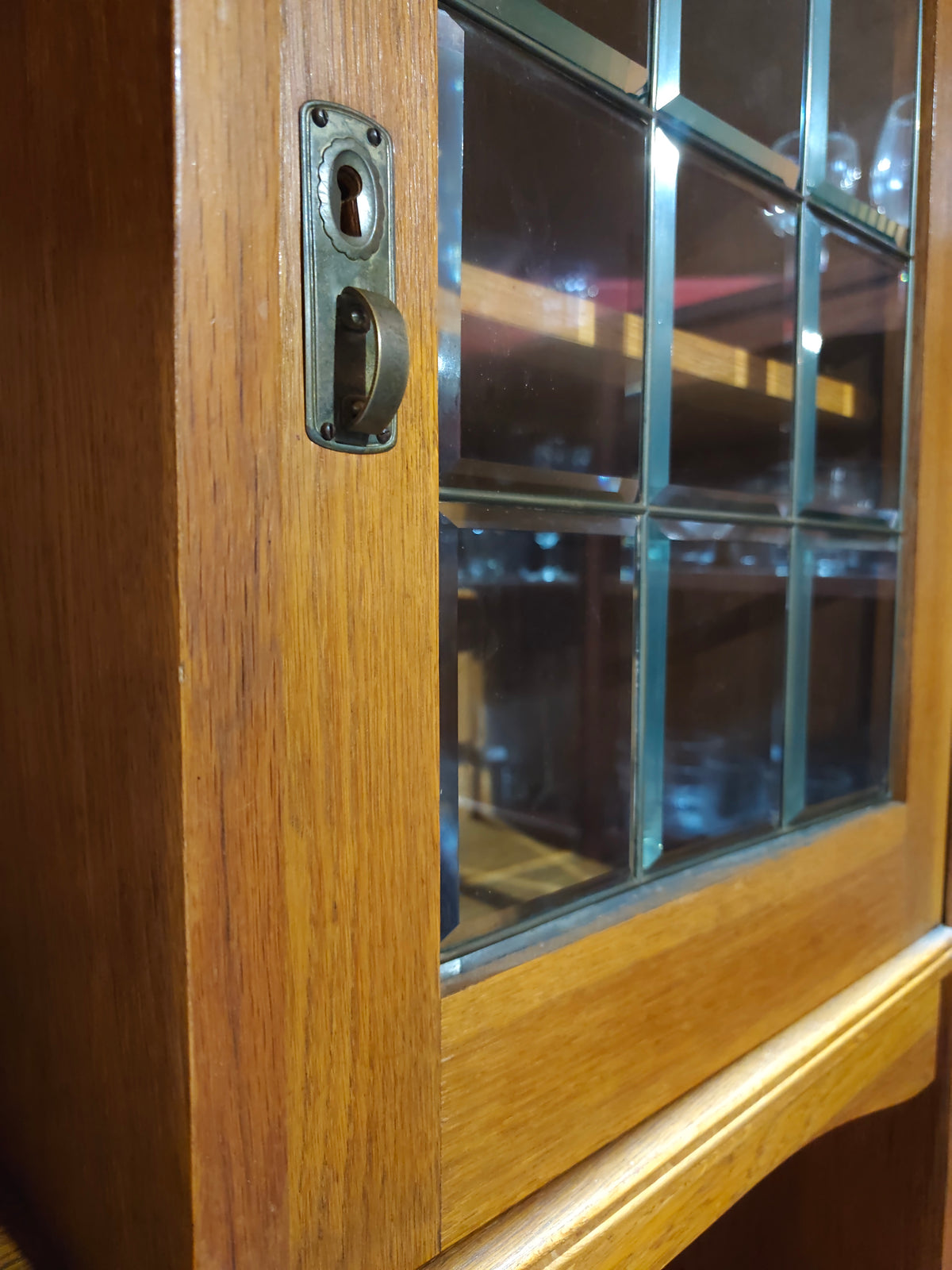 Solid wood buffet with carvings and faceted glass display cabinets